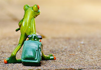 Cute Green Frog Figurine with Backpack and Sunglasses
