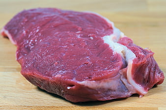 Fresh Raw Beef Steak On Wooden Cutting Board