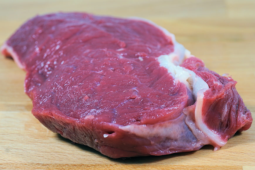 Fresh Raw Beef Steak On Wooden Cutting Board