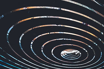 Abstract Spiral Metal Structure with Concentric Rings