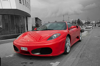 Red Ferrari F430 Coupe Parked On Urban Street
