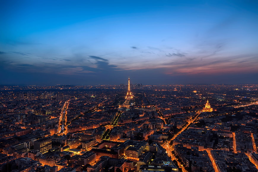Aerial View of Paris Cityscape at Dusk with Eiffel Tower