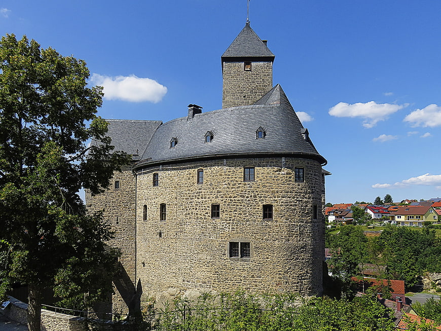 Historic stone castle tower on a sunny day