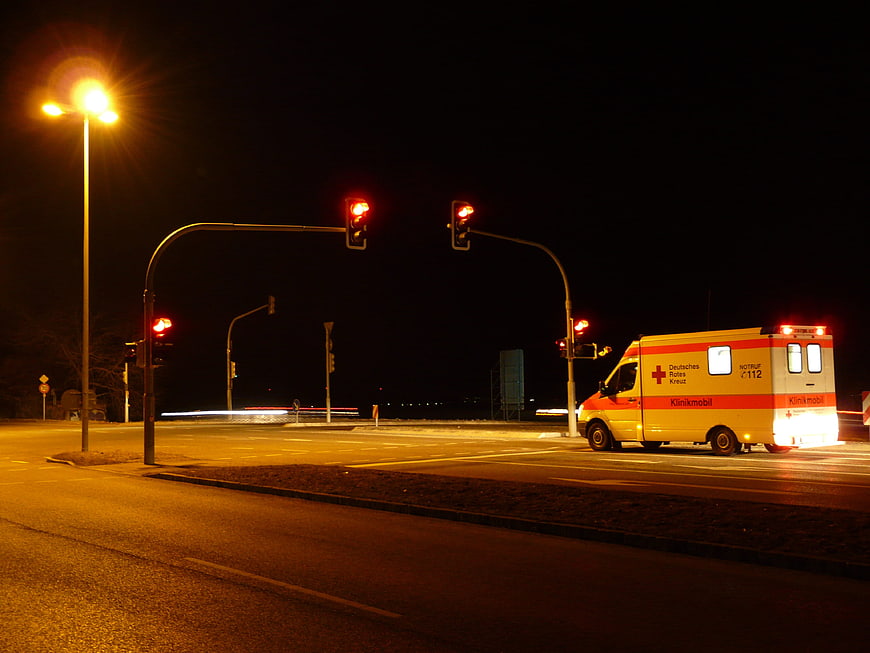 German Red Cross Ambulance at Night Intersection