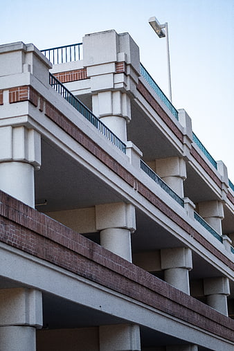 Low angle view of multi-level concrete parking garage architecture