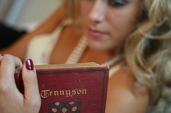 Woman Reading Vintage Tennyson Book Close Up