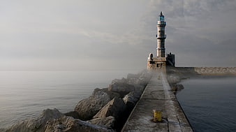 Misty Lighthouse on Stone Pier at Sea