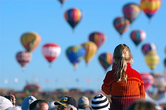 Child Watching Hot Air Balloons At Festival