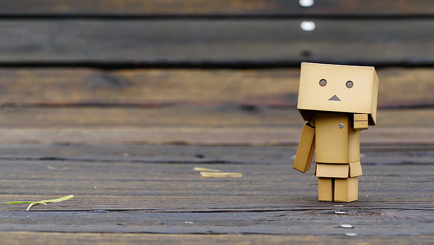 Danboard cardboard robot figure on wooden deck