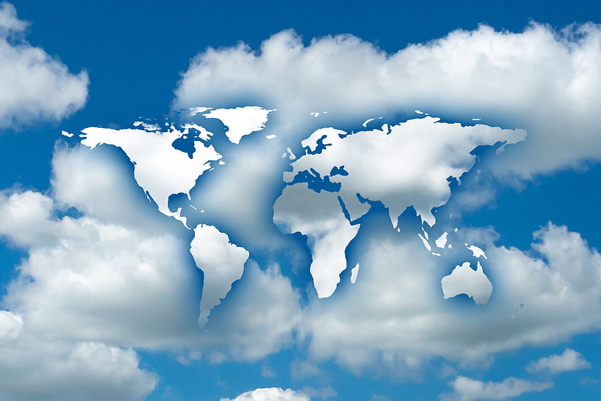 World Map Formed by Clouds in Blue Sky