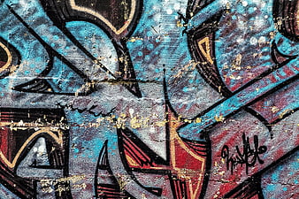 Abstract Blue And Red Graffiti Texture On Weathered Concrete Wall