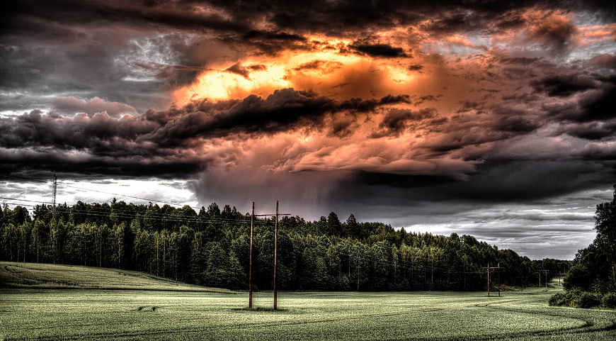 Dramatic Stormy Sky Over Rural Forest Landscape