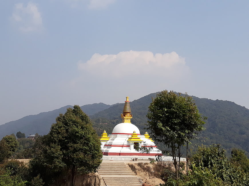 White Buddhist Stupa with Golden Spire in Nepal