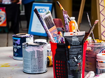 Acrylic Paint Supplies and Brushes on Art Table