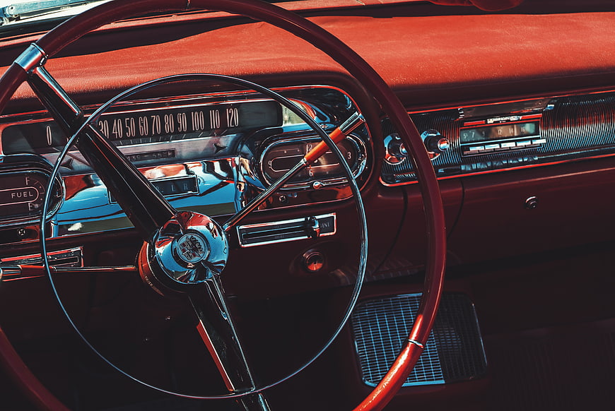 Vintage Classic Car Interior Dashboard and Steering Wheel