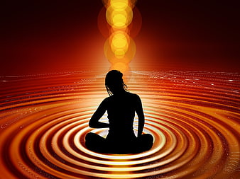 Silhouette of woman meditating on abstract orange waves