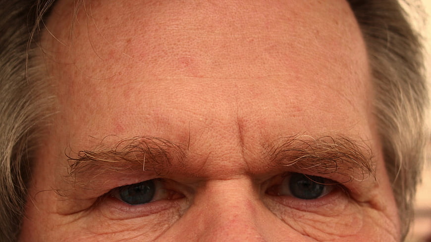 Close-up of elderly man's eyes and forehead