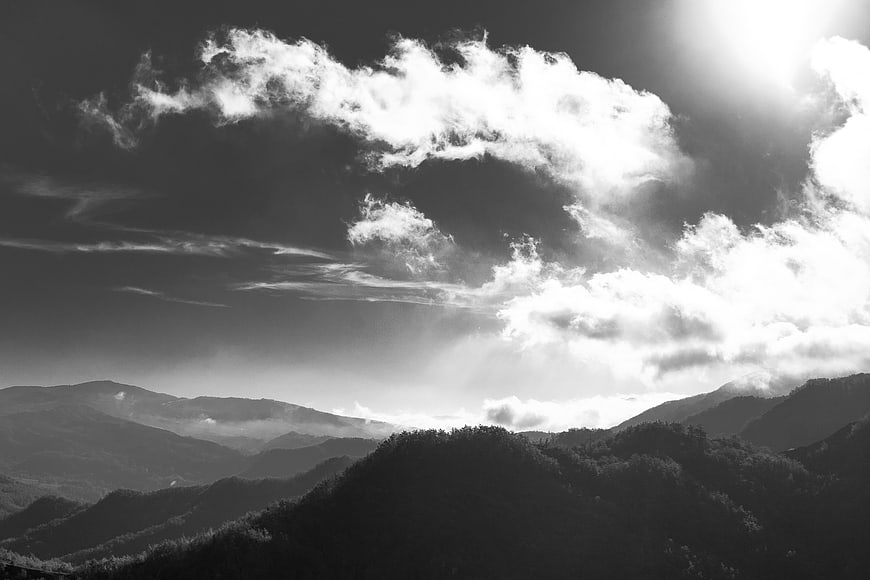 Dramatic Black and White Mountain Landscape with Sunbeams