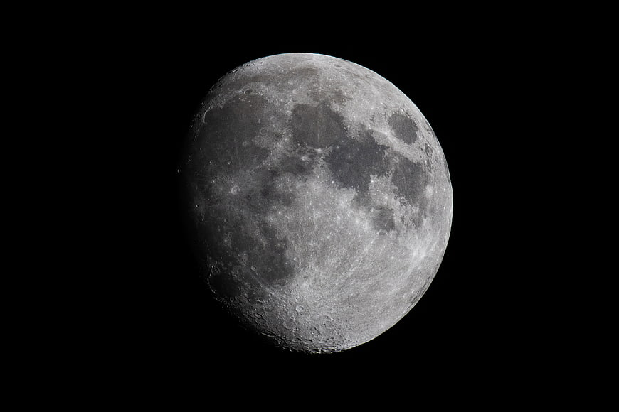 Detailed Waxing Gibbous Moon Against Black Sky