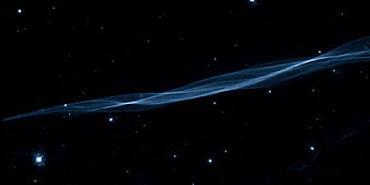Blue Nebula Filament and Stars in Deep Space