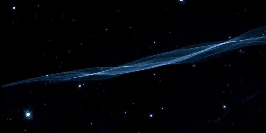 Blue Nebula Filament and Stars in Deep Space