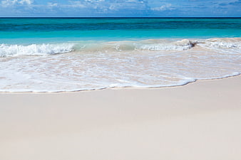 Tropical Beach with Turquoise Water and White Sand