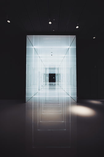 Futuristic illuminated glass corridor with neon grid lines