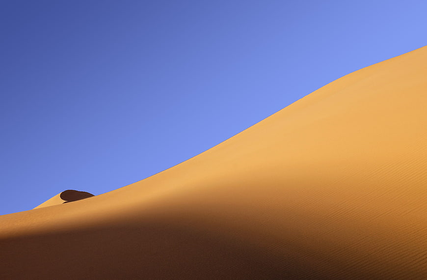 Minimalist Sand Dune Landscape with Blue Sky