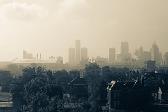 Hazy City Skyline with Residential Foreground