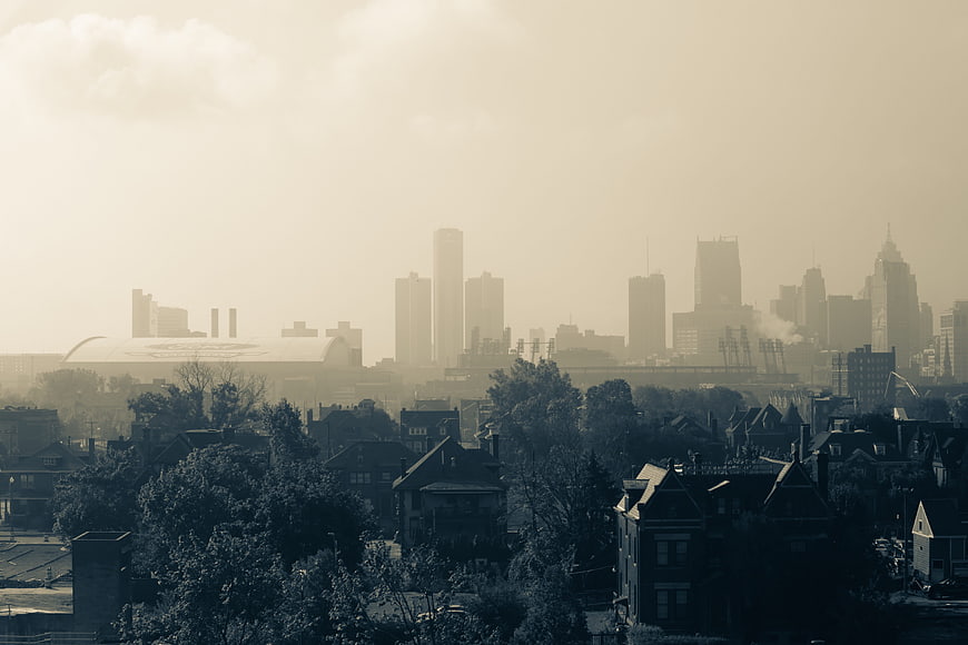 Hazy City Skyline with Residential Foreground