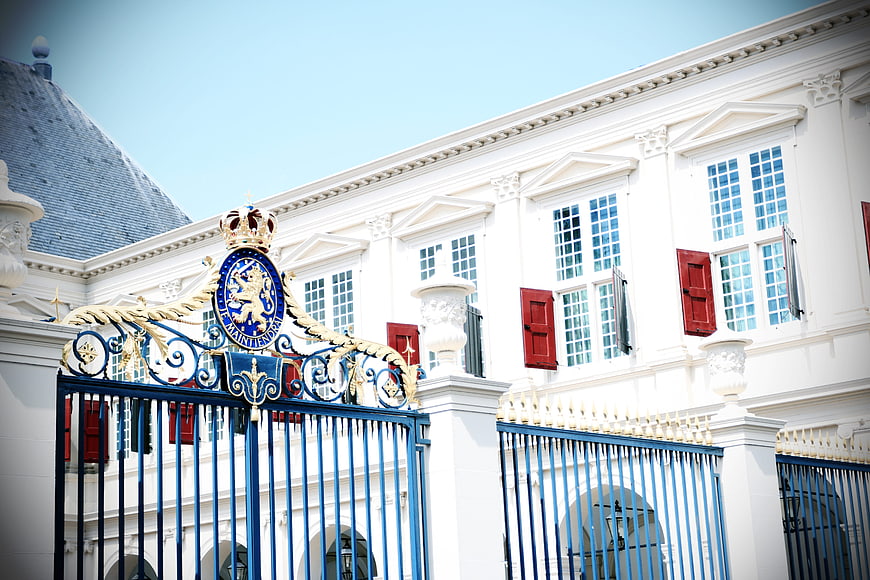 Ornate blue and gold gate of the Royal Palace of Amsterdam
