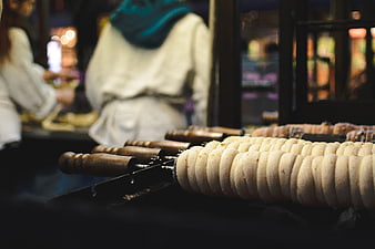 Traditional Czech Trdelnik Pastry Baking on Skewers