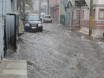 Severe Urban Street Flooding With Submerged Vehicles