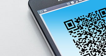 Close-up of QR Code on Smartphone Screen