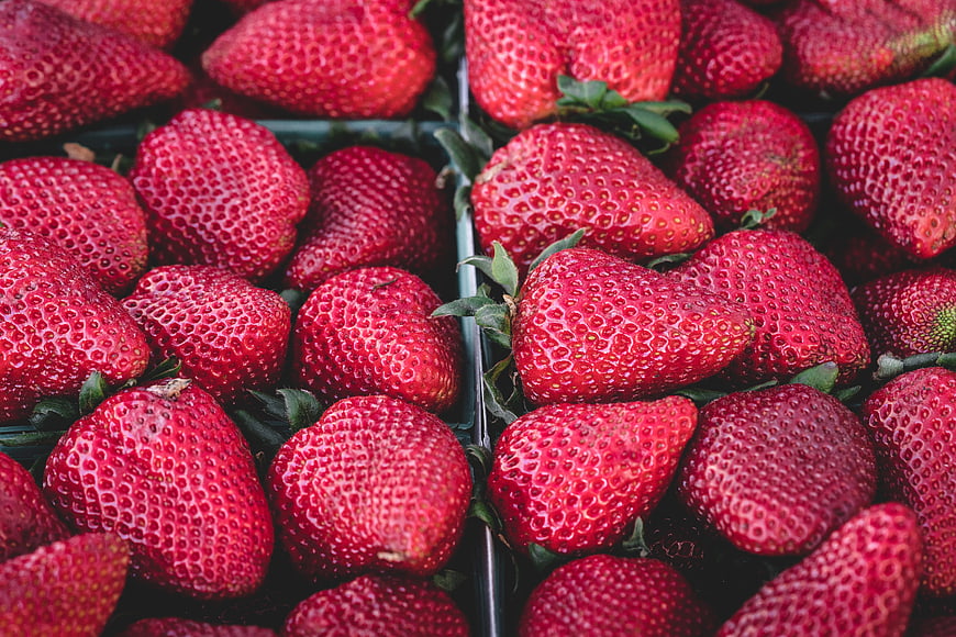 Fresh Ripe Strawberries in Plastic Containers