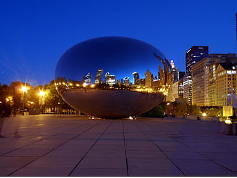 Chicago Cloud Gate Sculpture At Night With City Skyline Reflection