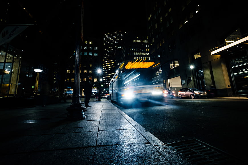 Long Exposure Night City Street with Blurred Bus
