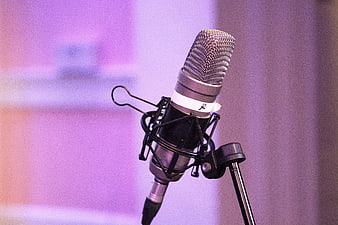 Professional Studio Microphone Close-Up With Soft Purple Background