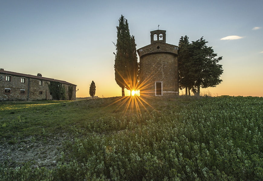Sunset over Tuscan Chapel and Stone Farmhouse