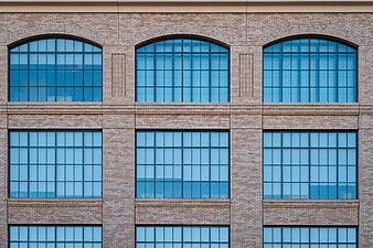 Modern Brick Building Facade with Blue Windows
