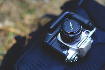 Silver Canon EOS M50 Camera on Black Bag