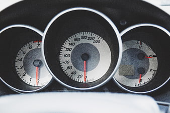 Close-up of car dashboard speedometer and gauges