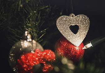 Close-up of Glittering Christmas Ornaments on a Tree