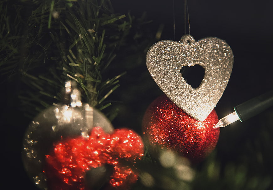 Close-up of Glittering Christmas Ornaments on a Tree