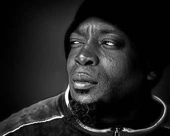 Black and White Portrait of a Man Wearing a Beanie