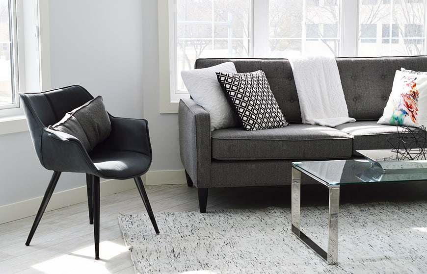 Modern Gray Living Room with Sofa and Leather Chair