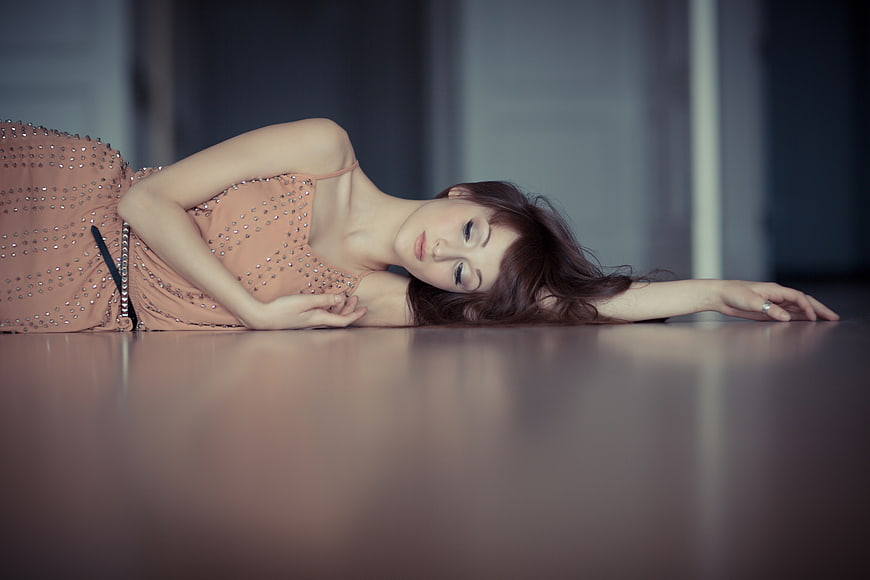 Woman in Pink Dress Lying on Floor