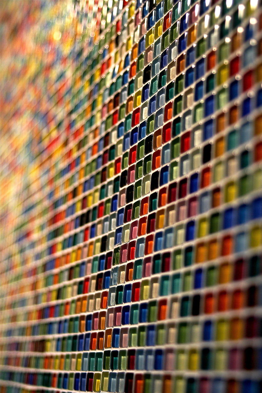 Colorful mosaic tile wall with shallow depth of field