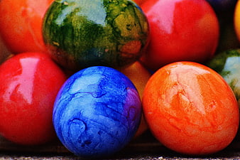 Close-up of vibrant multicolored Easter eggs with marbled patterns