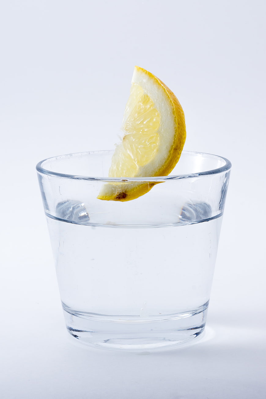 Refreshing Glass of Water with Lemon Slice and Ice